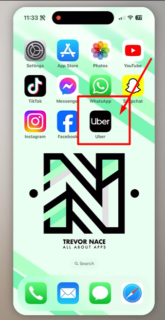 On the mobile screen pointing towards uber app