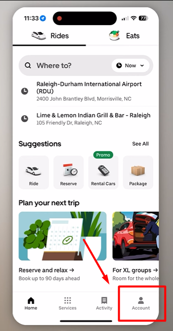 Pointing to Account button in uber app